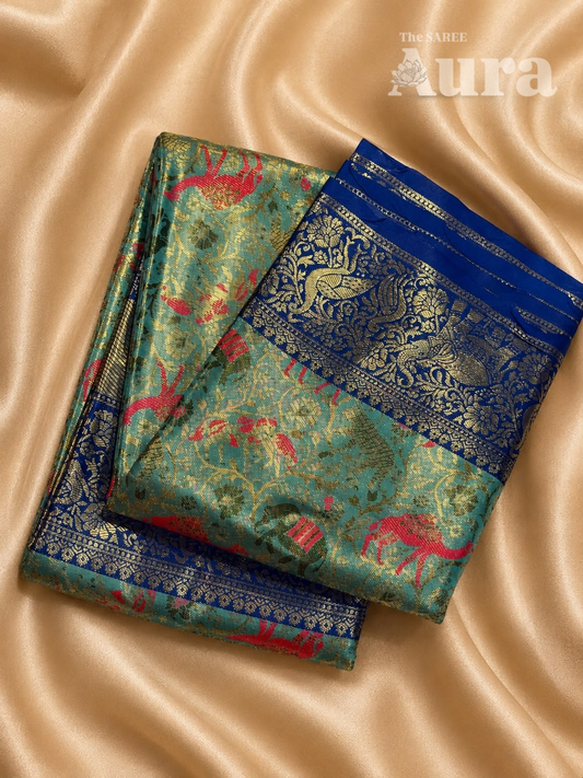 Kanjivaram Silk saree with animal & zari weaves (Sea green & royal blue)